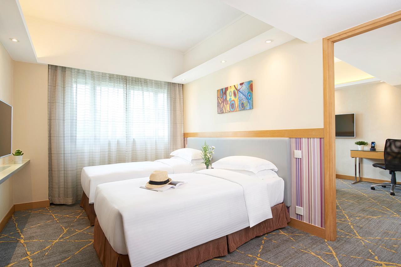 Deluxe Vierbettzimmer (1 Doppelzimmer und 2 Einzelbetten)